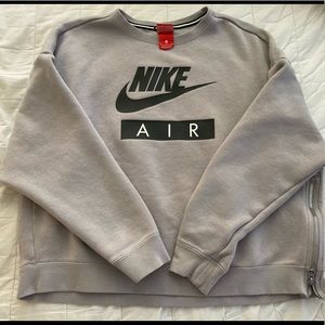 Nike Size Medium. Grey side zip sweater.